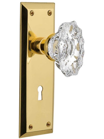New York Door Set with Keyhole and Chateau Crystal Glass Knobs in Polished Brass.